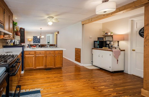 Buford House | Experience Lake Front Bliss with Top-Rated Comforts