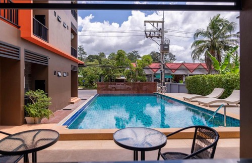 Downtown Krabi Hotel | Thip Thip Hotel: Oceanfront Escape with Pool & Breakfast
