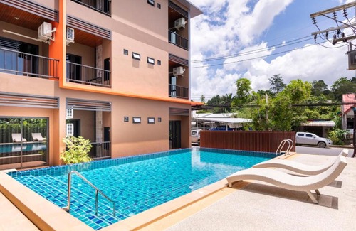 Downtown Krabi Hotel | Thip Thip Hotel: Oceanfront Escape with Pool & Breakfast