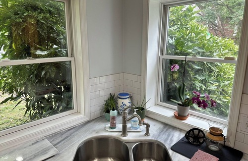 Bala-Cynwyd House | This 4 BR 4 BA sizable home with large outdoor porch & yard is ideal for a family visiting the area.