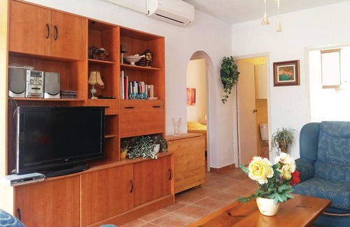 La Nucia House | This beautiful vacation semi-detached house is located in a quiet settlement with pool, tennis court