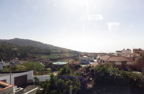 Vilaflor Apartment | This room has two single beds with an en-suite bathroom. The room has views of the village square.