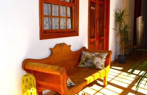Vilaflor Apartment | This room is a bunk room with two single bunk beds. The bathroom and showers are shared with the two other bunk rooms . The room has a great view of the village square.