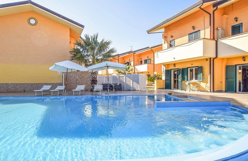Laura House | Family-Friendly Retreat with Pool Access and Ocean Views