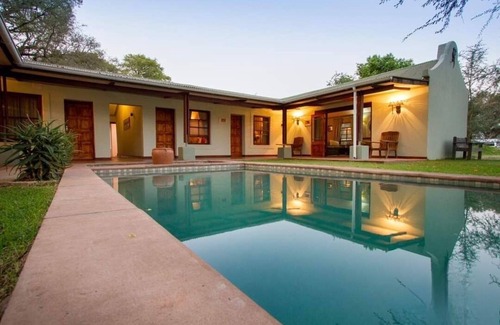 Livingstone Cabin | Discover Thorn Tree House: Family-Friendly with Pool & Dining