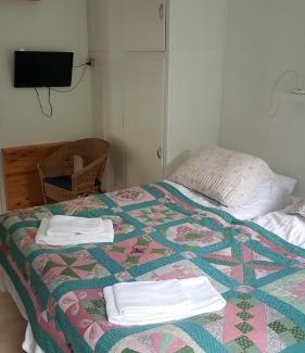 Knebel House | Discover Thorup Guesthouse: Oceanfront Retreat with Breakfast