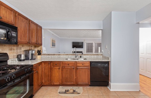 Town Center House | Modern Three-Level Retreat with Home Theater & Amenities
