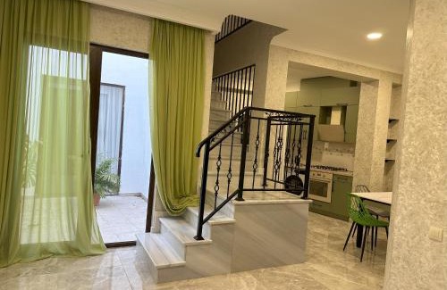Tbilisi Apartment | Unforgettable Stays at Three Palms House: Pet & Child Friendly