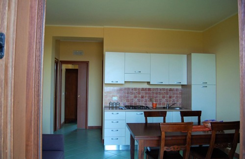 Santa Tecla Apartment | Inviting Sea View Apartment with Pool and Garden Retreat