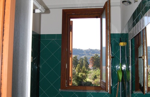 Santa Tecla Apartment | Inviting Sea View Apartment with Pool and Garden Retreat