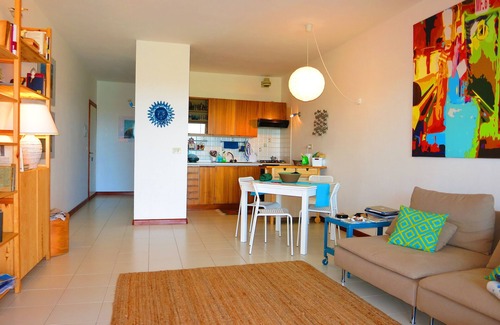 San Teodoro Apartment | Inviting Three-Room Apartment with Sea View and Garden
