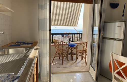 Casuzze Apartment | Steps from the Sea: Oceanfront Family Retreat Awaits