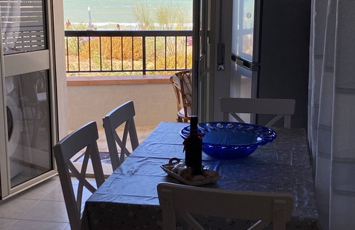 Casuzze Apartment | Steps from the Sea: Oceanfront Family Retreat Awaits