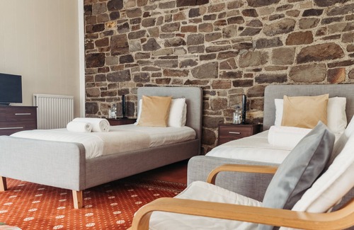 Howey Bed & Breakfast | Welcoming Three Wells: Family-Friendly with Breakfast & Kitchen