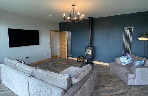 Honley House | Discover Three Winds Guesthouse: Pet-Friendly Retreat