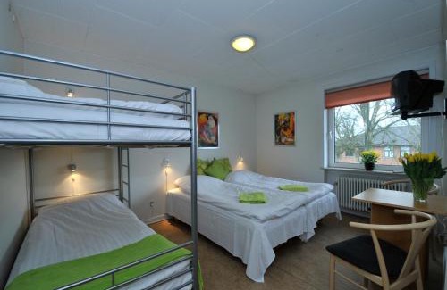 Skygge Hotel | Explore Thyregod Kursuscenter with Pool and Family Amenities