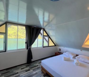 Teahupoo Ski Chalet | Experience Tiare with Breathtaking Faaroa Bay Views