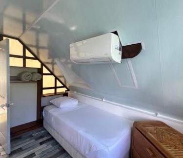 Teahupoo Ski Chalet | Experience Tiare with Breathtaking Faaroa Bay Views