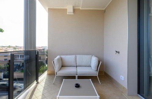 Isola Sacra Apartment | Tiber Terrace Retreat - Free Parking, Wi-Fi & Netflix
