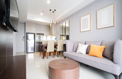 Suko Manunggal Apartment | Comfortable 2BR Retreat at Grand Sungkono Lagoon