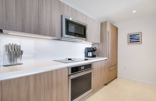 Central Beach Condo | Premier Stay at Tiffany Indigo: Rooftop Pool & Walk to Beach
