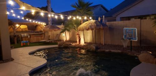 Ashley Park House | Relaxing Tiki Time Pool Home in Chandler for 8 Guests