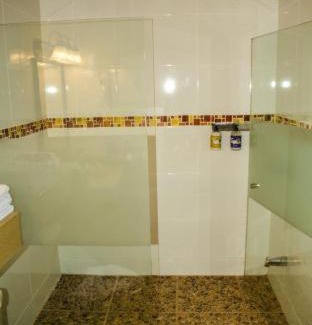Muelle San Carlos Hotel | Relaxing Tilajari Hotel Resort with Pool & Ocean Views