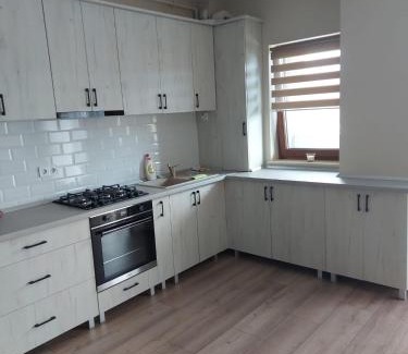 Bistrita Apartment | Discover Timea's House: Family-Friendly & Highly Rated Stay