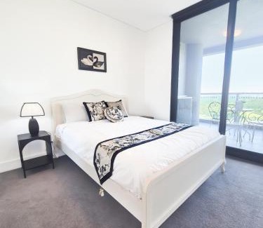 Sydney Olympic Park Apartment | Timeless Black n White Charm 2BR w Kids room