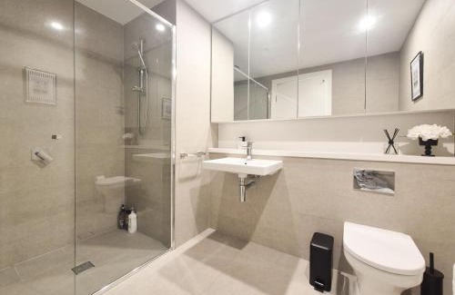 Sydney Olympic Park Apartment | Timeless Black n White Charm 2BR w Kids room