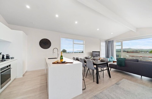 Taupo House | Guest Rated: 9.8 at Wheretia Street with Family Amenities
