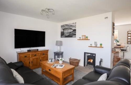 Benllech House | Experience Tinkers Patch: Pet-Friendly 4-Star Retreat