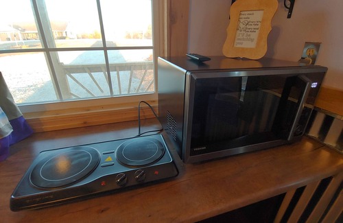 Buchanan County Cabin | Pet-Friendly Tiny Cabin on the Farm with Ocean View