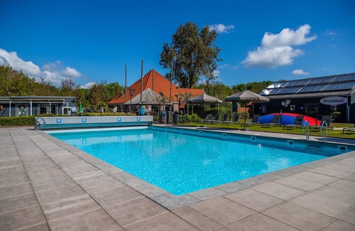 Velsen-Zuid House | Cozy Tiny House with Pool and Spa on Holiday Park
