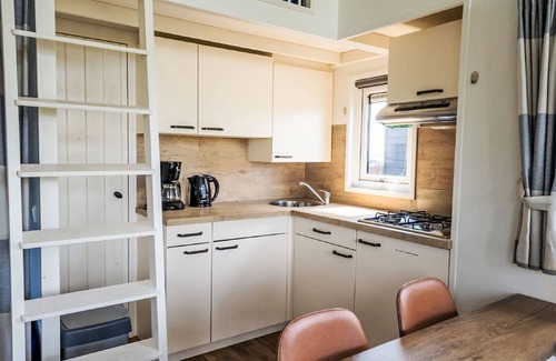 Bovenkarspel House | Explore Tiny House 4: Lake View & Spa Retreat Awaits