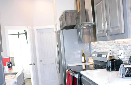 Okmulgee House | Unforgettable Twin Lake Tiny Homes: Spa & Hot Tub Retreat
