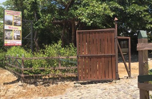 Curubande Cabin | Discover Tiquisia Lodge: Pet Friendly & Family Welcoming