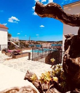 Tisno Apartment | Beachfront Bliss at Tisno Resort - 4 Star with Pool & Hot Tub