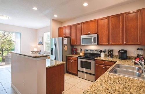 Crestwynd Bay House | Family-Friendly Tito's Beachy Townhouse near Disney Bliss