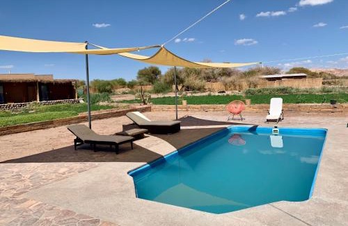San Pedro de Atacama Bed & Breakfast | Experience Tiunur Lodge: Oceanfront Retreat with Pool