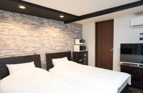 Sumoto Onsen Apartment | Discover Tiz 海岸通り: Family & Pet-Friendly Getaway