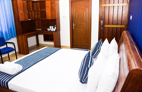 Mahiyanganaya Hotel | Warm and Inviting Atmosphere with Kitchen Amenities