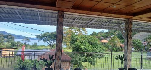 Tuk Tuk House | Budget-Friendly Toba Boi: Pet & Child Friendly Haven