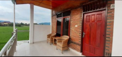 Tuk Tuk House | Budget-Friendly Toba Boi: Pet & Child Friendly Haven