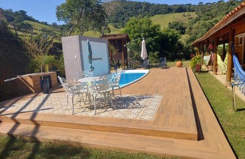 Sao Bento do Sapucai House | Pet-Friendly Retreat at Toca - Bairro Serrano, 4-Star Stay