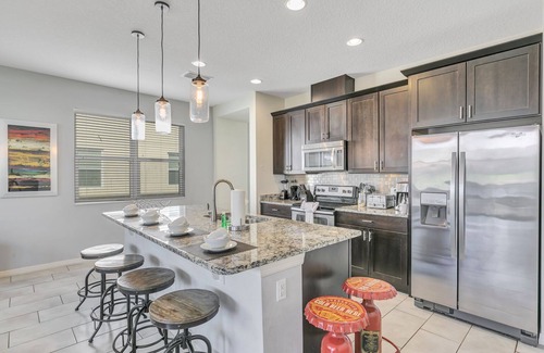 Kissimmee House | Discover Tocoa Bay: Top-Rated 4BD Townhome by Disney