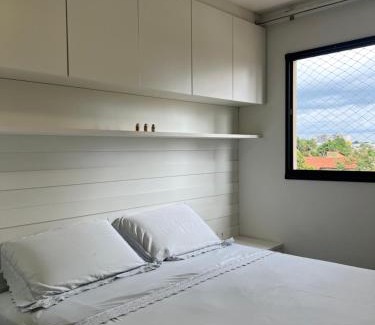 Plano Diretor Sul Apartment | Prime Location with Pool and Ocean Views for Every Guest