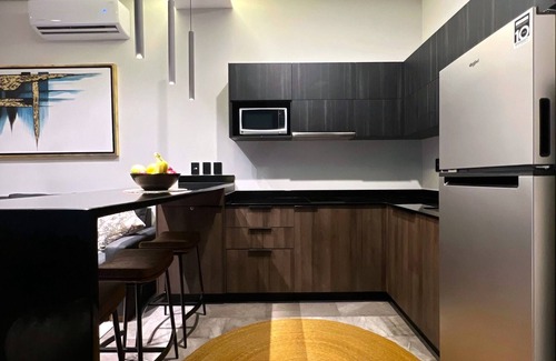Playa Paraiso Condo | Toes In the Sand - High Speed WIFI, Bike to Beach