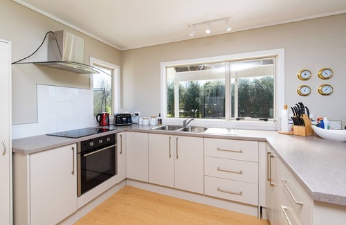 Karkari Peninsula House | Tokerau Magic - Family-Friendly Retreat with Ocean Views