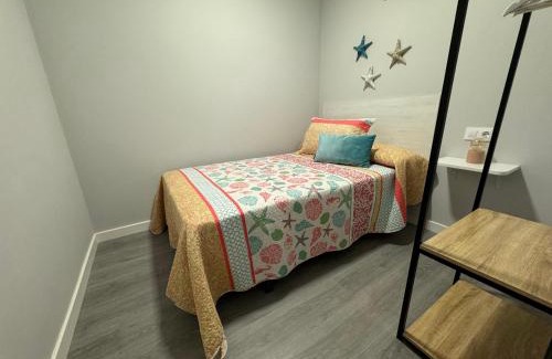 Portonovo Apartment | Oceanfront Tolería Costamar with Family-Friendly Amenities
